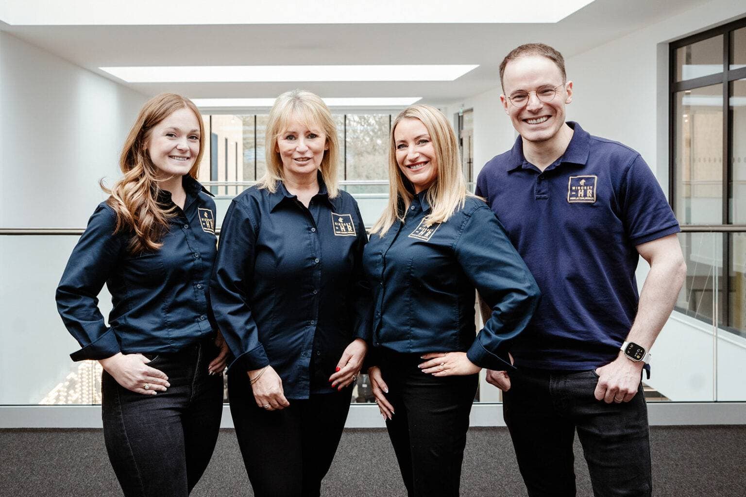 The four members of the Mindset HR team together in the office